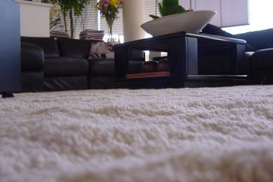 Inspiration for a modern home theatre in Perth with carpet.