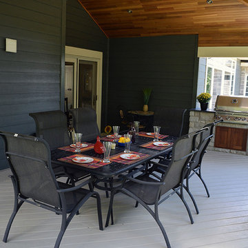 A stone deck built on steel substructure and a covered porch deck in Veka vinyl.