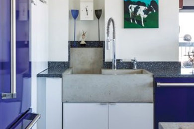 Eclectic kitchen in Kansas City with a farmhouse sink.