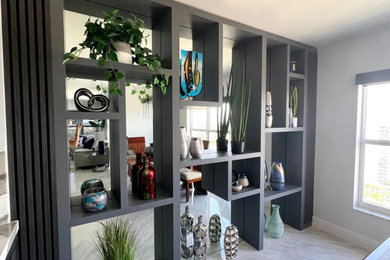Example of a mid-sized minimalist home design design in Miami