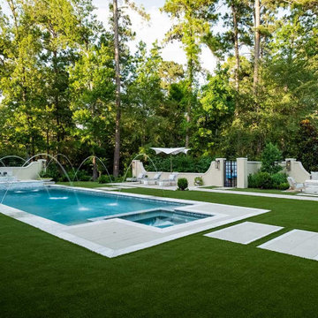 Rectangular pool, covered patio and kitchen, outdoor shower, landscaping