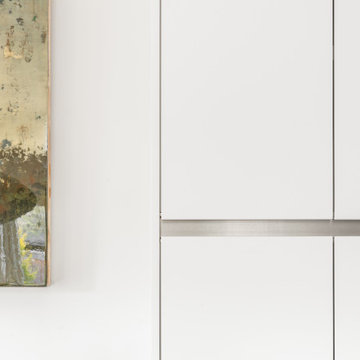 Flat-Panel Cabinetry with Integrated Aluminum Reveal – Minimalist Modern Detail,