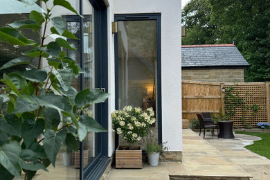 Patio - modern patio idea in Other