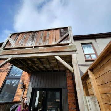 The old two-level deck at the back of the North York house before it was rebuilt