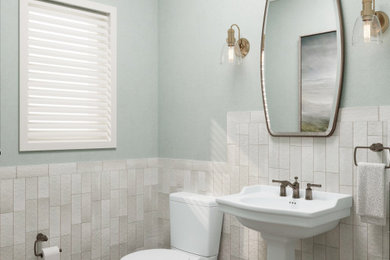 Powder room - small craftsman white tile and porcelain tile wood-look tile floor, brown floor and wallpaper ceiling powder room idea in Phoenix with a one-piece toilet, green walls and a pedestal sink