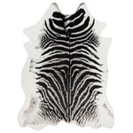 Erin Gates - Erin Gates Acadia Zebra Machine Made Modern Area Rug Black - 5'3" X 7'10" - The safari style of this decorative area rug is artfully crafted with humane design in mind. An innovative pairing of acrylic and polyester fibers create the course impression of hair-on-hide, giving each animal print rug the look of leather with a totally touchable texture. Available in zebra, cheetah, and cow print, suede backing adds a supple finish to the underside of this decorative floorcovering, exhibiting exquisite attention to detail that�s cosmopolitan, yet compassionate and cruelty free.
