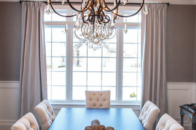 Inspiration for a mid-sized transitional dark wood floor enclosed dining room remodel in Chicago with gray walls and no fireplace