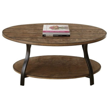 Bowery Hill Oval Cocktail Table in Light Oak Finish