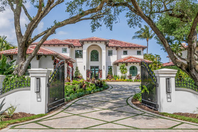 Example of a tuscan exterior home design in Miami