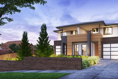 Design ideas for a contemporary two-storey brick duplex exterior in Sydney.