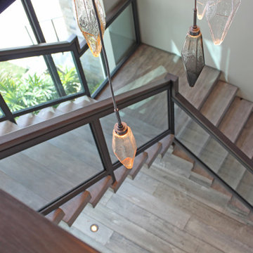 Steel Center Stringer with 4" Thick White Oak Treads & Tempered Glass
