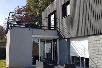 Cette photo montre une façade de maison tendance.
