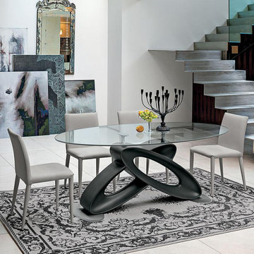 Eclipse round glass top fixed dining table by Target Point