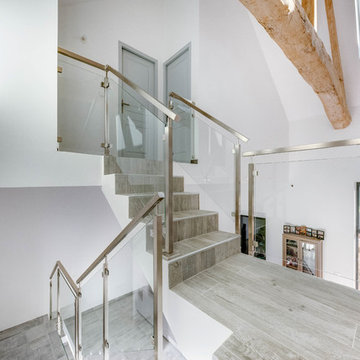 Garde-corps inox gamme carrée verre plein, escalier passerelle et mezzanine
