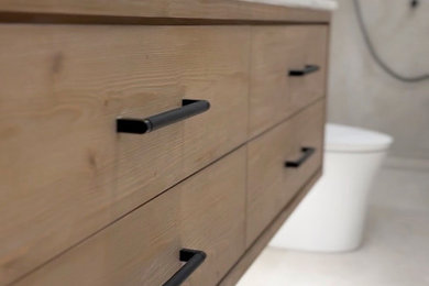 Mid-sized minimalist master gray tile and porcelain tile porcelain tile, gray floor and double-sink bathroom photo in Other with flat-panel cabinets, brown cabinets, a one-piece toilet, gray walls, an undermount sink, quartz countertops, white countertops and a floating vanity