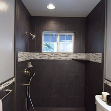 Grey Bathroom Tile and Carrara Marble Vanity