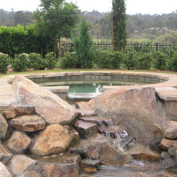 In-ground spa doubles as a waterfall feature.