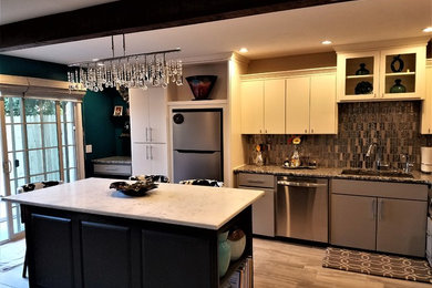 Inspiration for a modern ceramic tile and brown floor eat-in kitchen remodel in Oklahoma City with an undermount sink, flat-panel cabinets, white cabinets, granite countertops, stainless steel appliances and an island