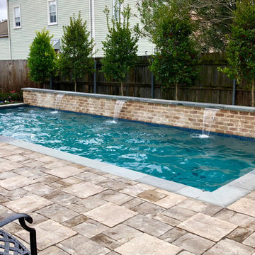L-Shaped Pool with Stone Deck