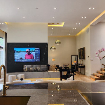 Open-Concept Kitchen Overlooking Family Room with Double-Height Ceilings