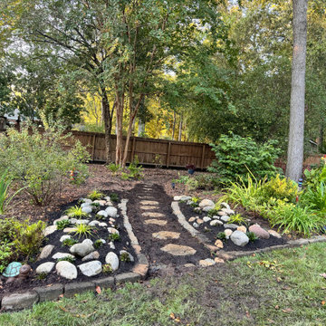This thoughtfully arranged garden bed features a harmonious blend of ornamental
