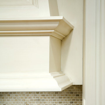 Custom range hood and tile backsplash