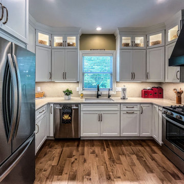 White Kitchen with Black Range Hood and Taj Royale quartz Countertops