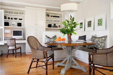 Kitchen/dining room combo - mid-sized transitional light wood floor kitchen/dining room combo idea in Boston with white walls