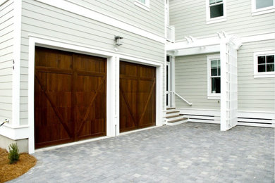 Example of a transitional garage design in Austin