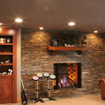 Eye-popping Denver Basement Remodel with hidden bookcase doors and tray ceilings