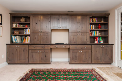 Example of an arts and crafts family room design in DC Metro