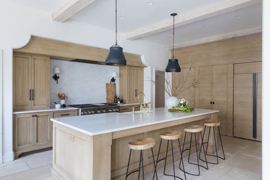 Inspiration for a transitional kitchen remodel in Birmingham with a farmhouse sink, beaded inset cabinets and marble countertops