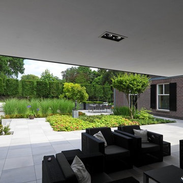 Moderne veranda bij klassiek huis