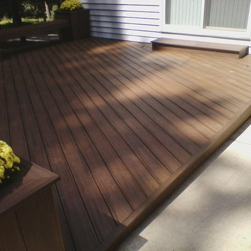 Ground level deck with planters