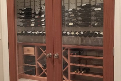 Inspiration for a timeless wine cellar remodel in New York