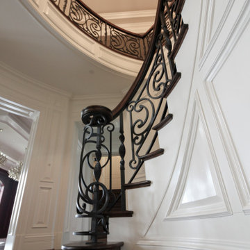 Project #74 | Circular Staircase with Hand-Forged Metal Panels