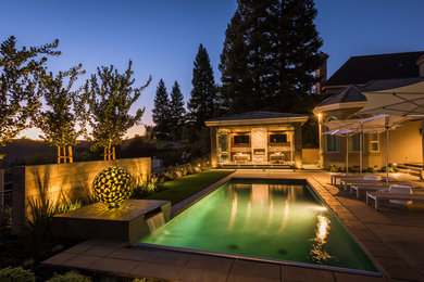 Trendy stone pool photo in Oxfordshire