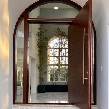 Hurricane Impact Pivot Door in Open Position | Miami-Dade Engineered
