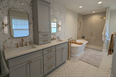 Inspiration for a large transitional master black and white tile and mosaic tile ceramic tile, beige floor and double-sink bathroom remodel in Chicago with recessed-panel cabinets, blue cabinets, white walls, an undermount sink, quartz countertops, a hinged shower door, white countertops and a built-in vanity