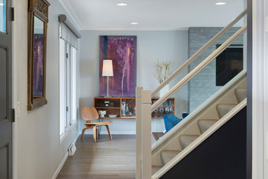 Contemporary entryway in Minneapolis with porcelain floors.