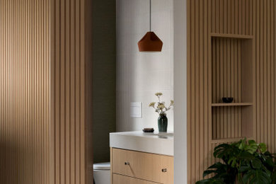 Example of a transitional powder room design in Vancouver