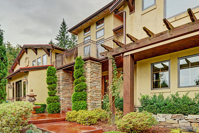 Example of a tuscan exterior home design in Seattle
