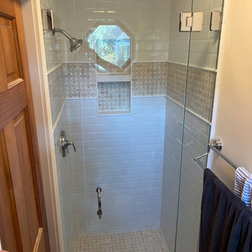Frameless Glass-to-Glass Hanging Shower with Notched Bullnose