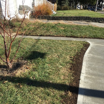 Front porch with concrete walkway to boost home sale.