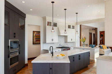 Large transitional medium tone wood floor kitchen photo in Other with an undermount sink, flat-panel cabinets, granite countertops, white backsplash, granite backsplash and white countertops