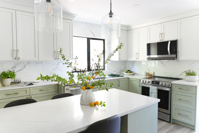 Enclosed kitchen - mid-sized contemporary u-shaped vinyl floor and gray floor enclosed kitchen idea in Vancouver with an undermount sink, shaker cabinets, green cabinets, quartz countertops, white backsplash, ceramic backsplash, stainless steel appliances, an island and white countertops