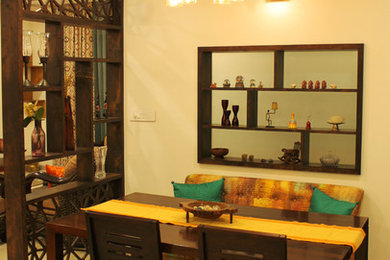 Design ideas for an eclectic dining room in Bengaluru.