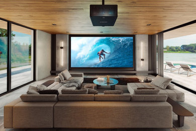 Foto de cine en casa minimalista de tamaño medio con pantalla de proyección