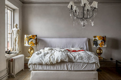 Example of an eclectic bedroom design