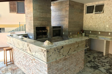 Example of a mountain style home bar design in Other